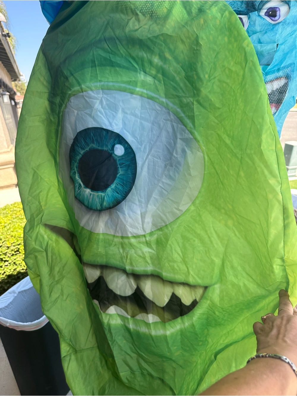 This Disguise Monsters Inc. Mike Wazowski inflatable costume features a large, d